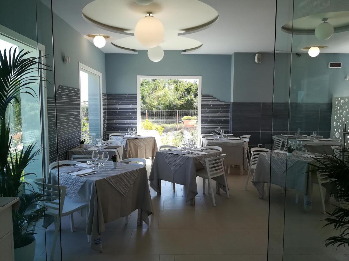 Tabu Hotel Porto Cesareo Bagian luar foto