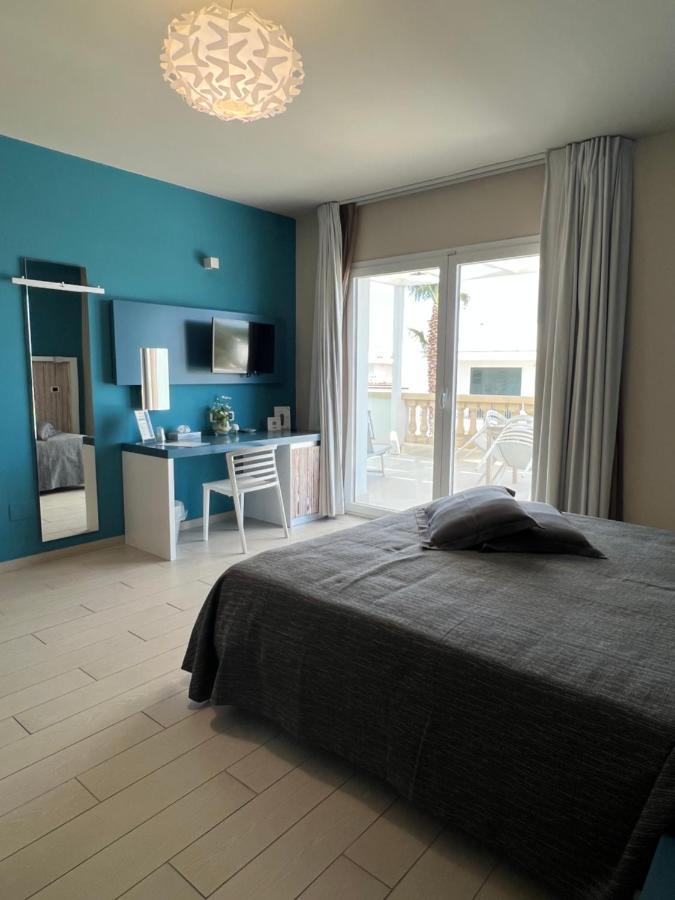 Tabu Hotel Porto Cesareo Bagian luar foto