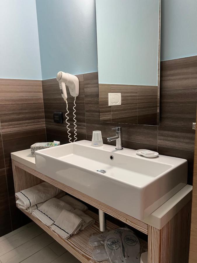 Tabu Hotel Porto Cesareo Bagian luar foto