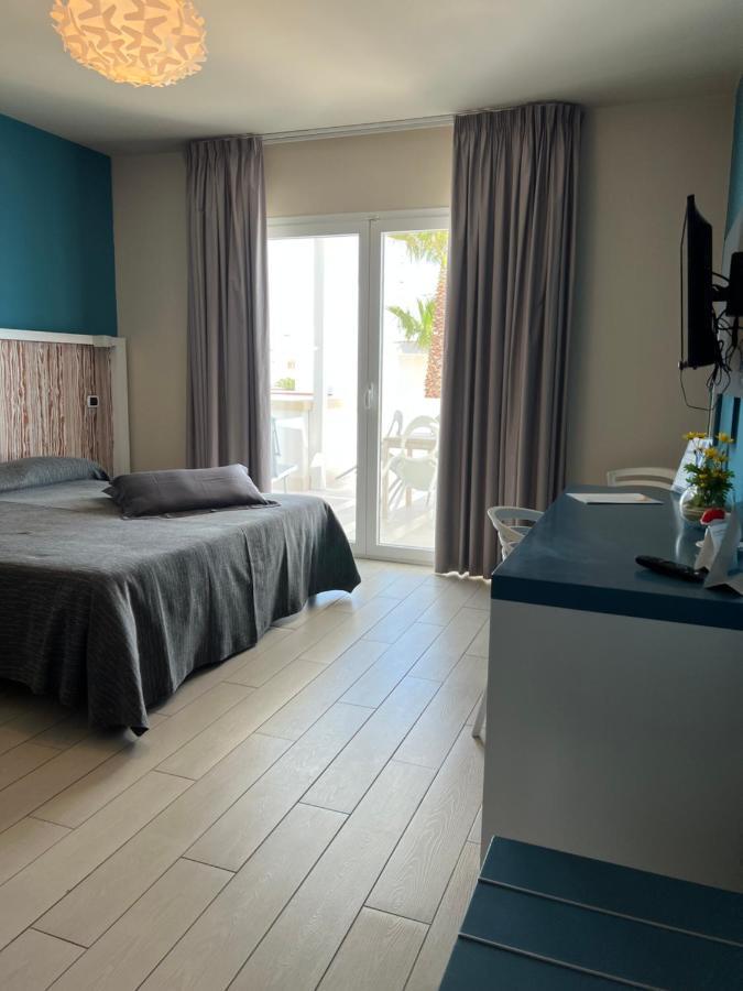 Tabu Hotel Porto Cesareo Bagian luar foto