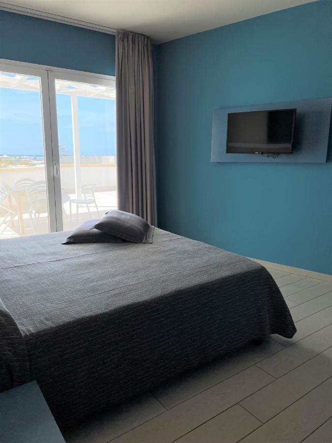 Tabu Hotel Porto Cesareo Bagian luar foto