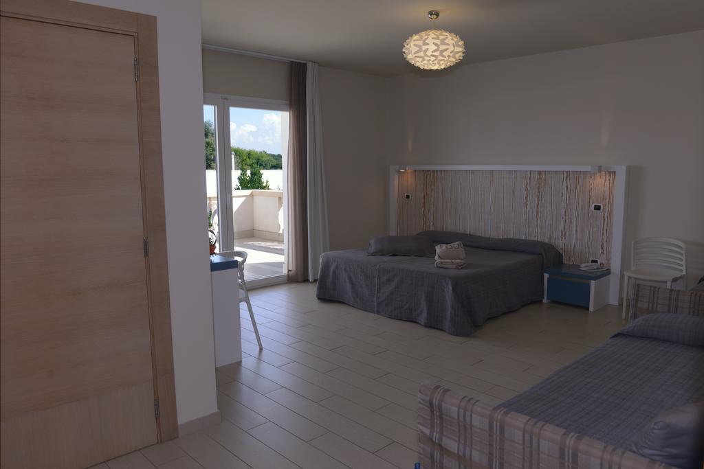 Tabu Hotel Porto Cesareo Bagian luar foto